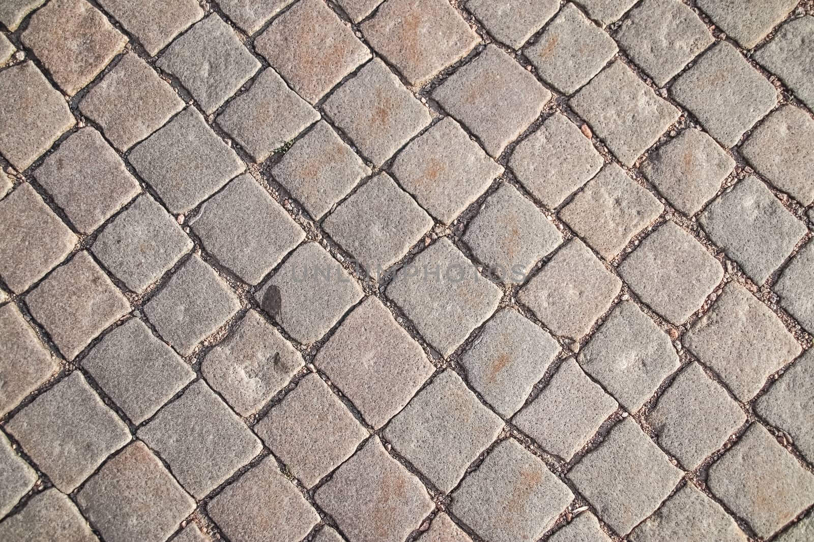 Stone Square brick block walk way for texture background. by anotestocker