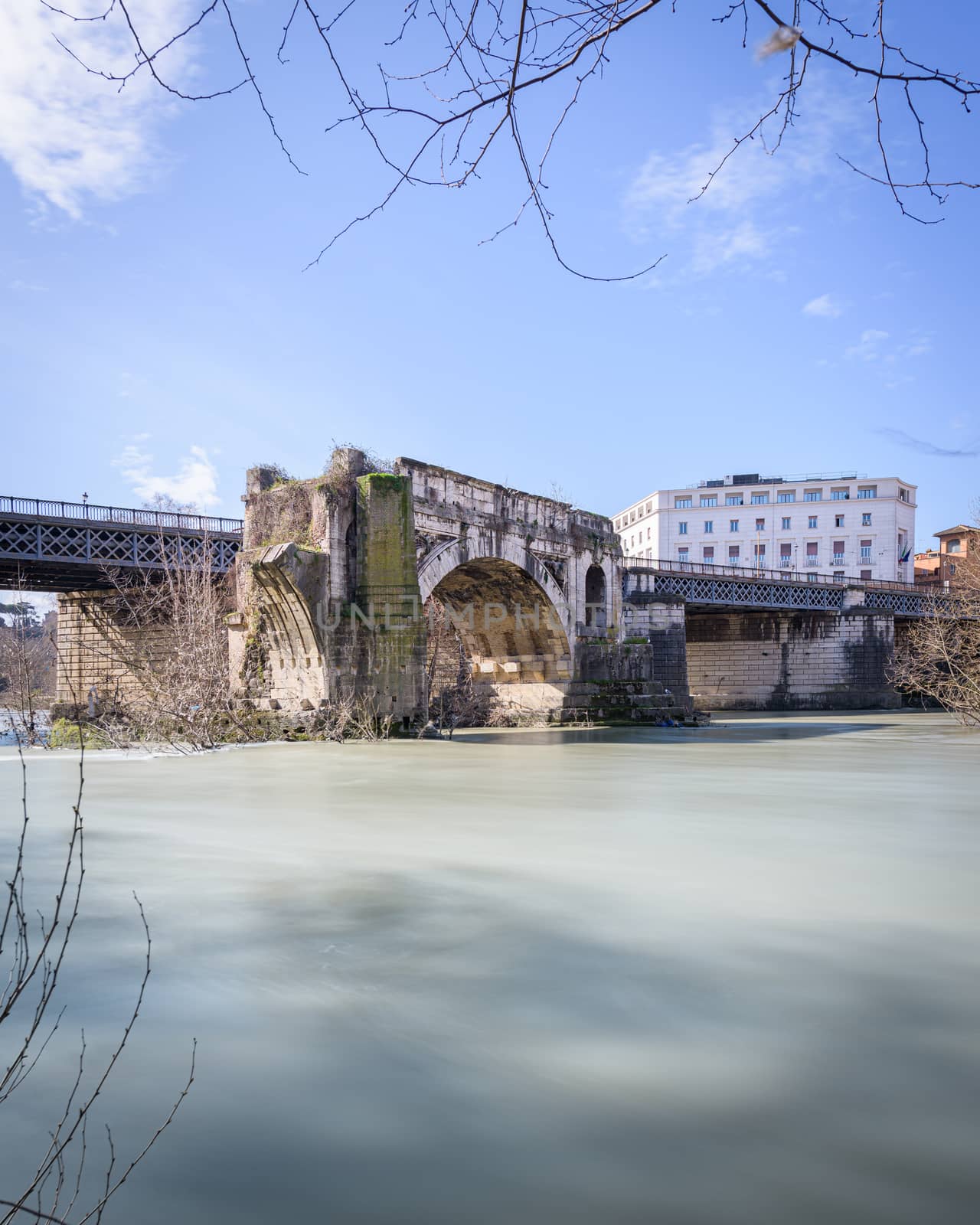 Emilio bridge or Ponte Rotto, ancient Roman bridge over the Tiber river, near the Isola Tiberina island in Rome, Italy