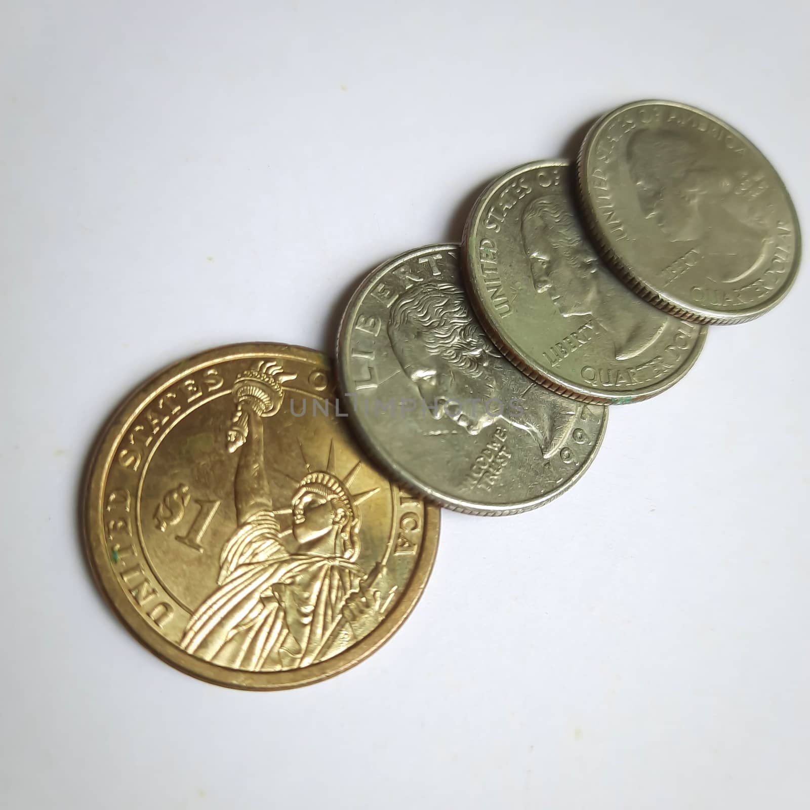 One dollar and quarter coin arranged diagonally in white chart background