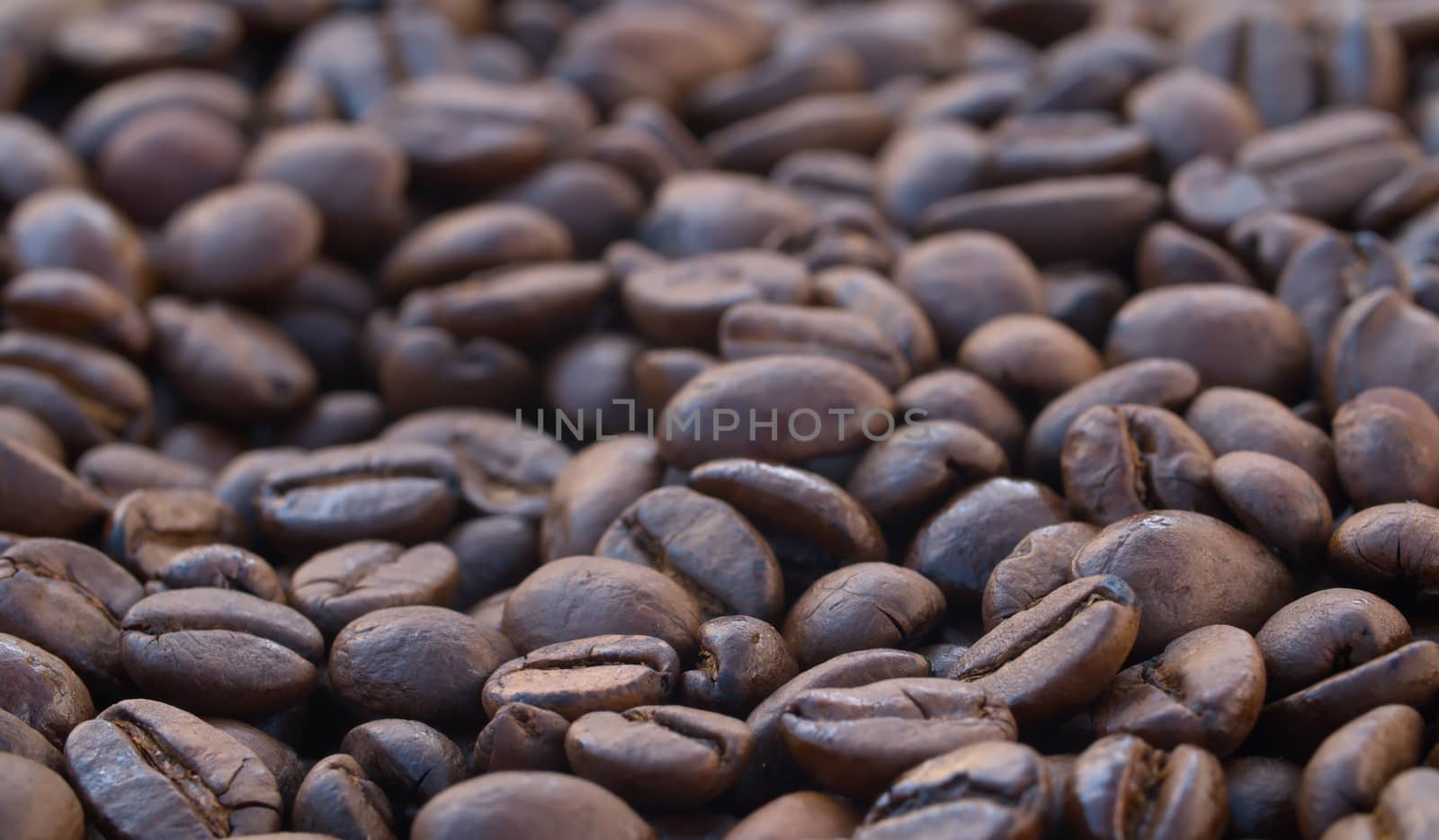 Macro shot of coffee beans. Coffee close up. Texture, background