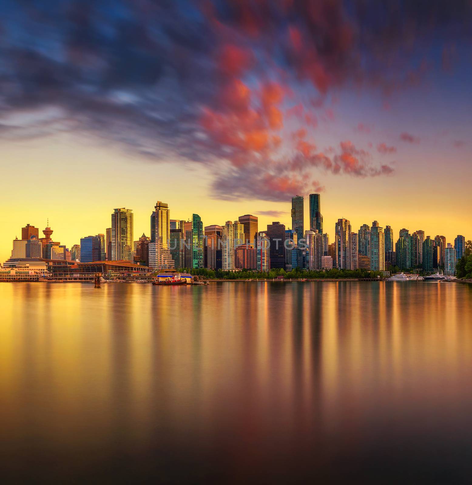 Sunset skyline of Vancouver downtown from Stanley Park by nickfox