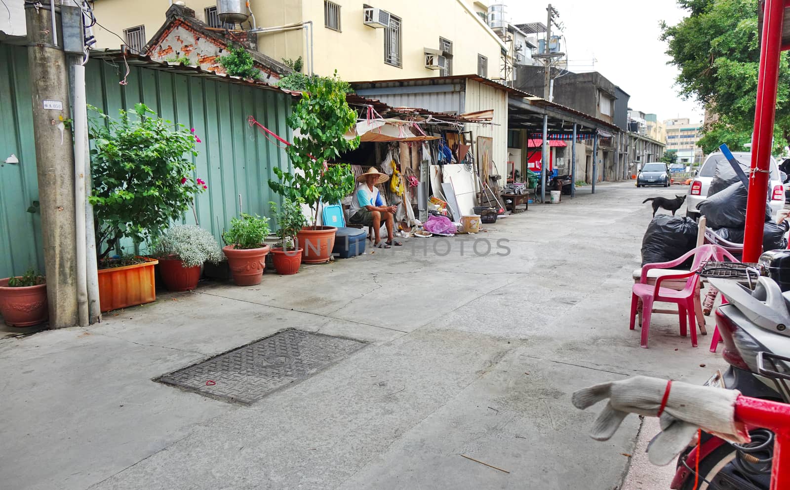 KAOHSIUNG, TAIWAN -- JULY 17, 2017: A quiet back street in one of the traditional neighborhoods of the city.