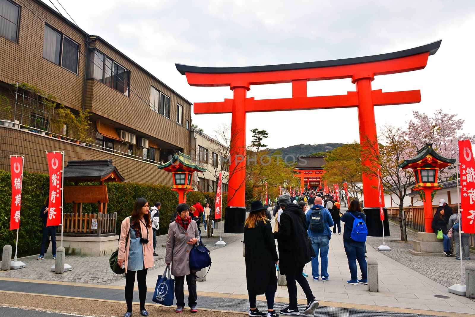 KYOTO, JP - APRIL 10 - Fushimi Inari Taisha shrine Japanese gate torii on April 10, 2017 in Kyoto, Japan. Fushimi Inari was dedicated to the gods of rice and sake by the Hata family in the 8th century.