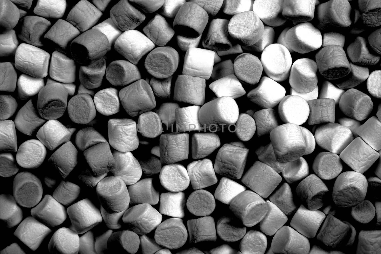 Marshmallow sweet confectionery texture background black and white monochrome image stock photo