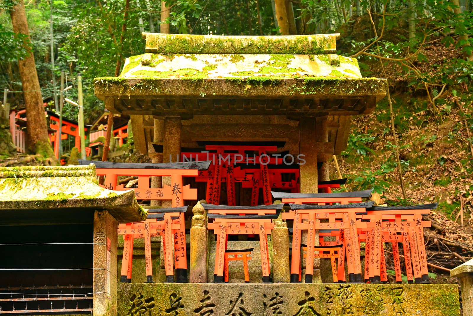 KYOTO, JP - APRIL 10 - Fushimi Inari Taisha shrine on April 10, 2017 in Kyoto, Japan. Fushimi Inari was dedicated to the gods of rice and sake by the Hata family in the 8th century.