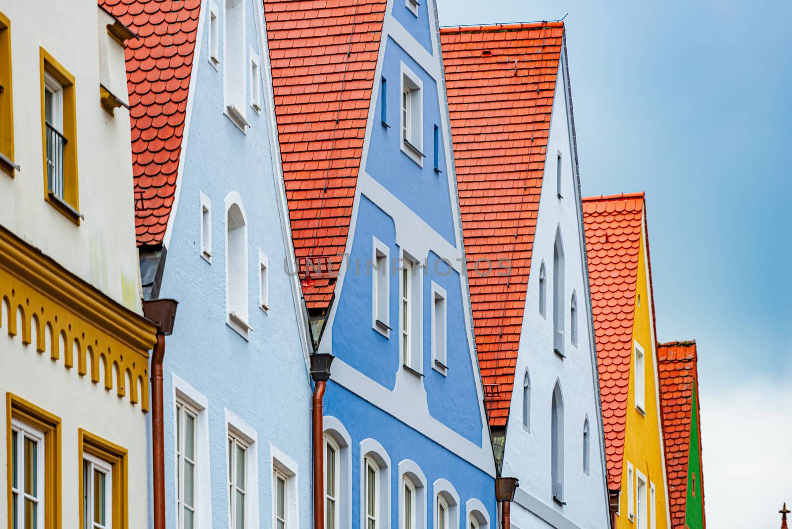 Oold town houses in Germany, Europe. Blue cloudy sky in background