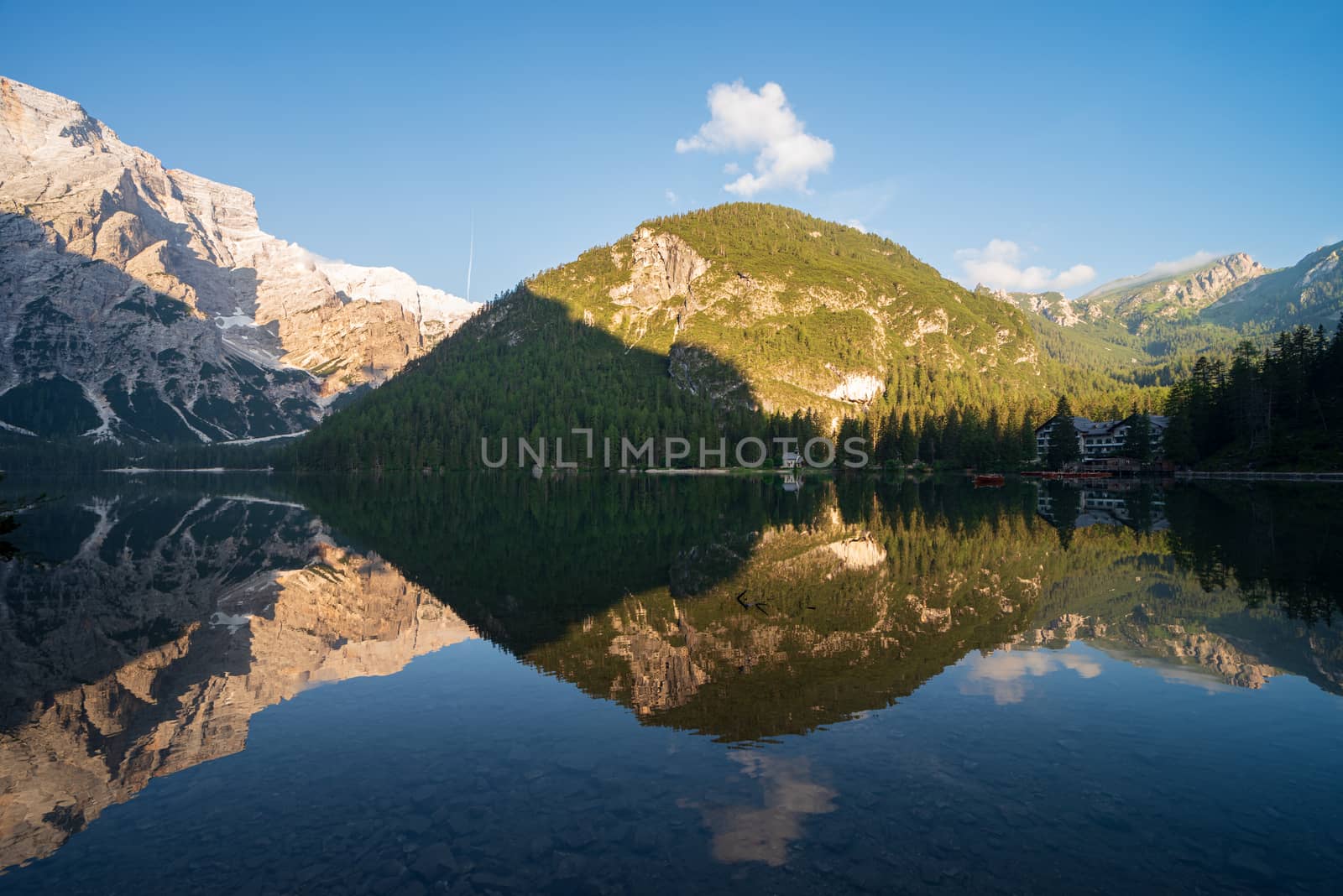 Mountain landscape reflected in the waters of Lake Braies, Italian Dolomites in South Tyrol