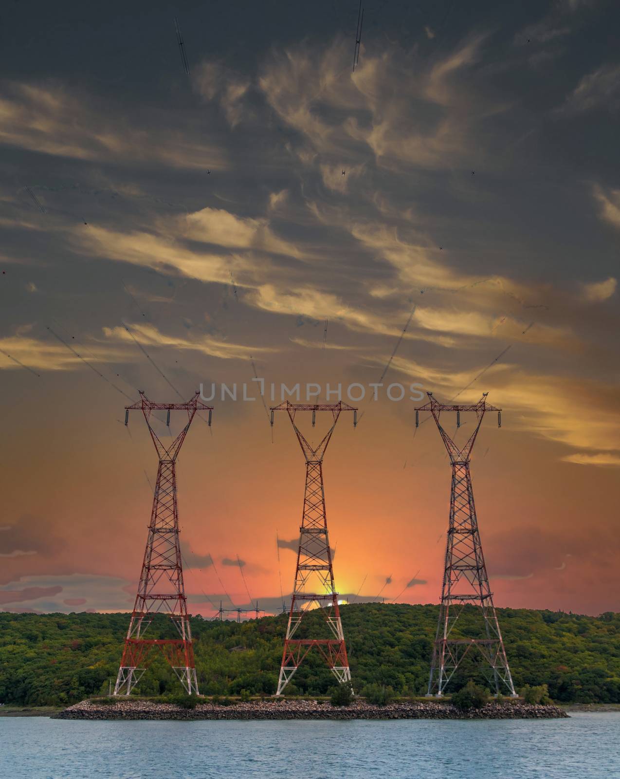 Three Power Pylons at Sunset by dbvirago