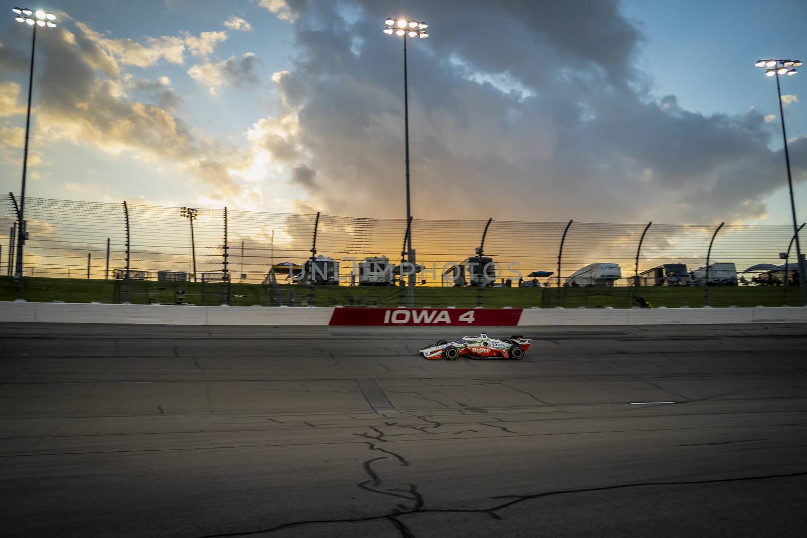 GRAHAM RAHAL (15) of the United States races through the turns during the race for the Iowa INDYCAR 250s at Iowa Speedway in Newton, Iowa.