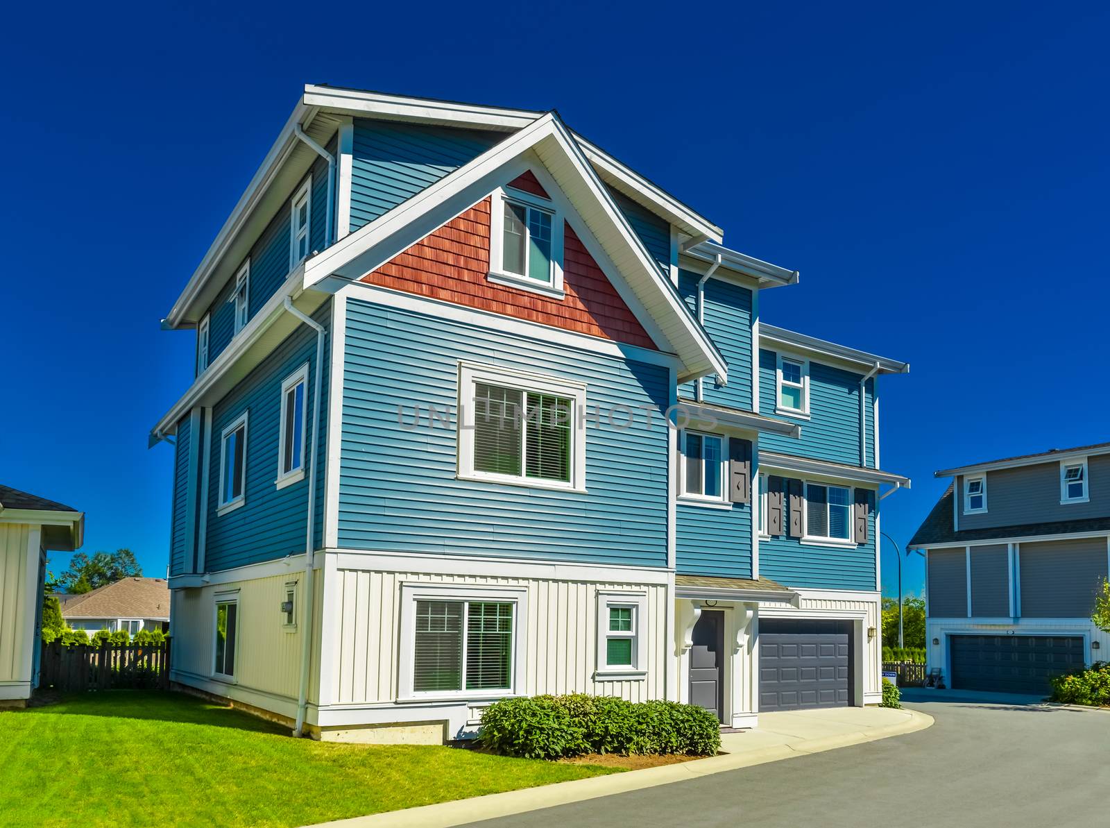 Nice and comfortable neighborhood. New homes, condos, and townhouses on a street in suburbs of Vancouver, Canada