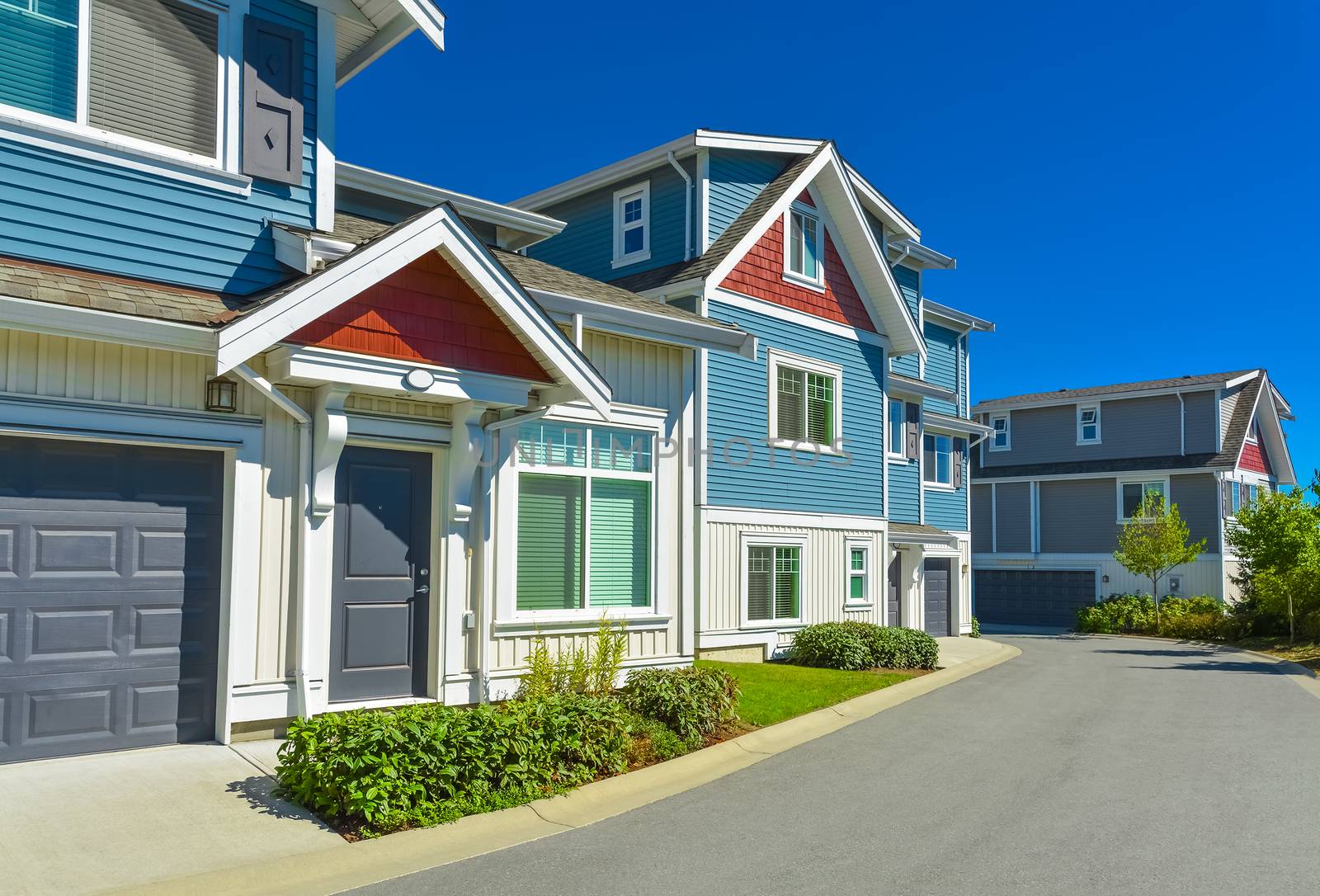 Nice and comfortable neighborhood. Row of new homes, condos, and townhouses on a street in suburbs of Vancouver, Canada