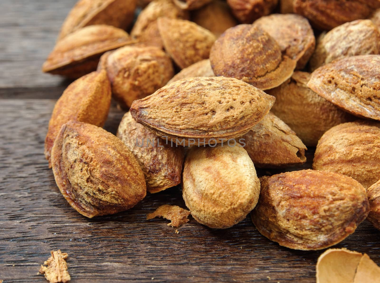 almonds place on a wooden table