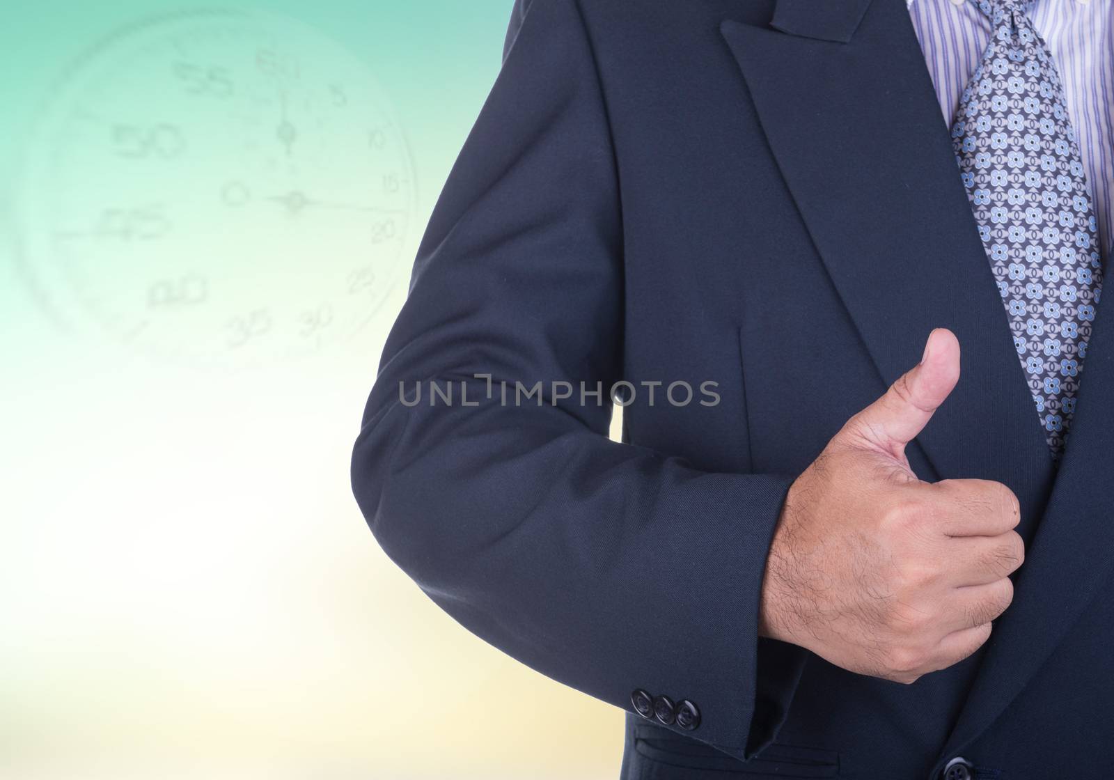 Business man showing a success sign gesture.