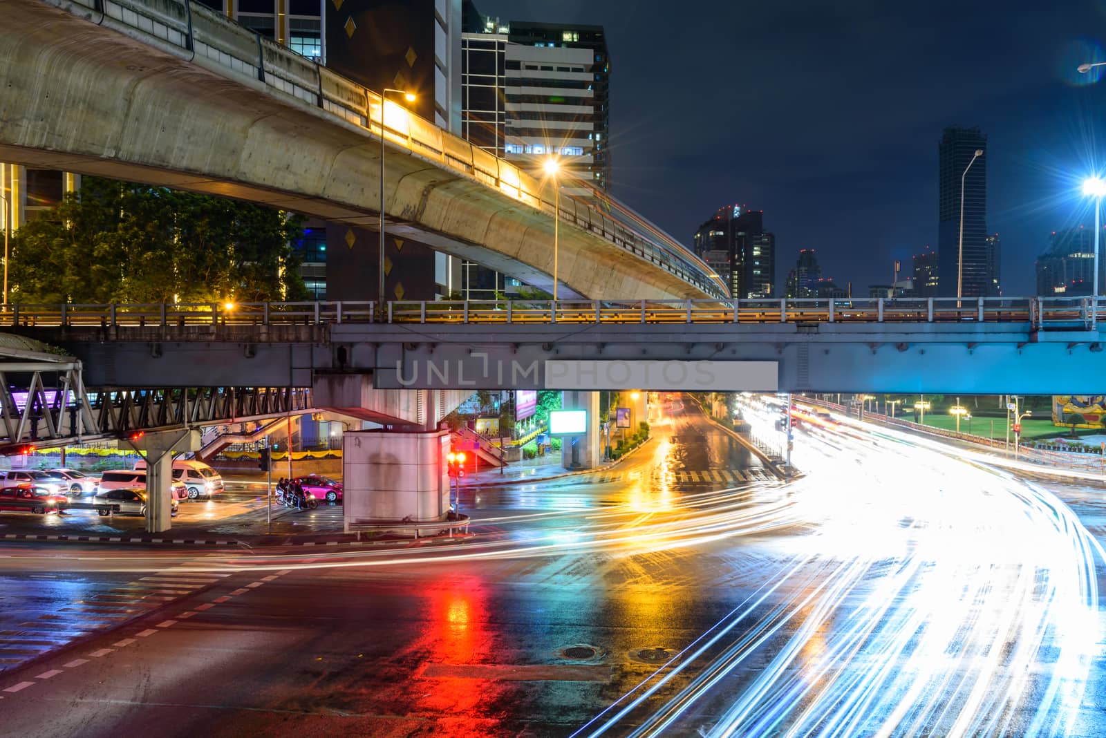 Blur light of traffic at Saladang junction in city by rukawajung