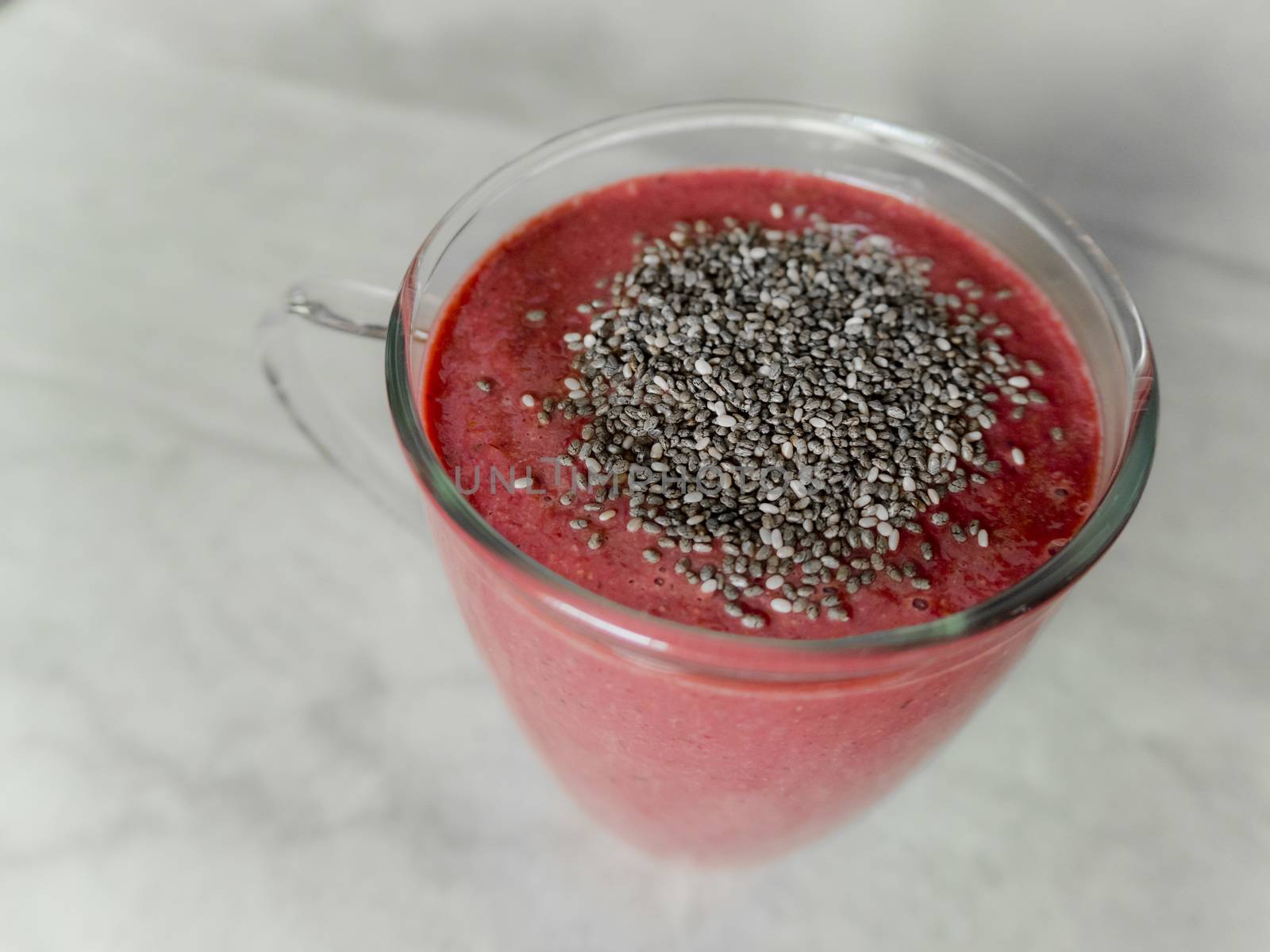 Red berry smoothie with chia seeds. by Arkadij