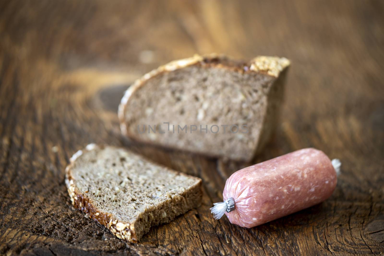 german minced meat sausage on wood