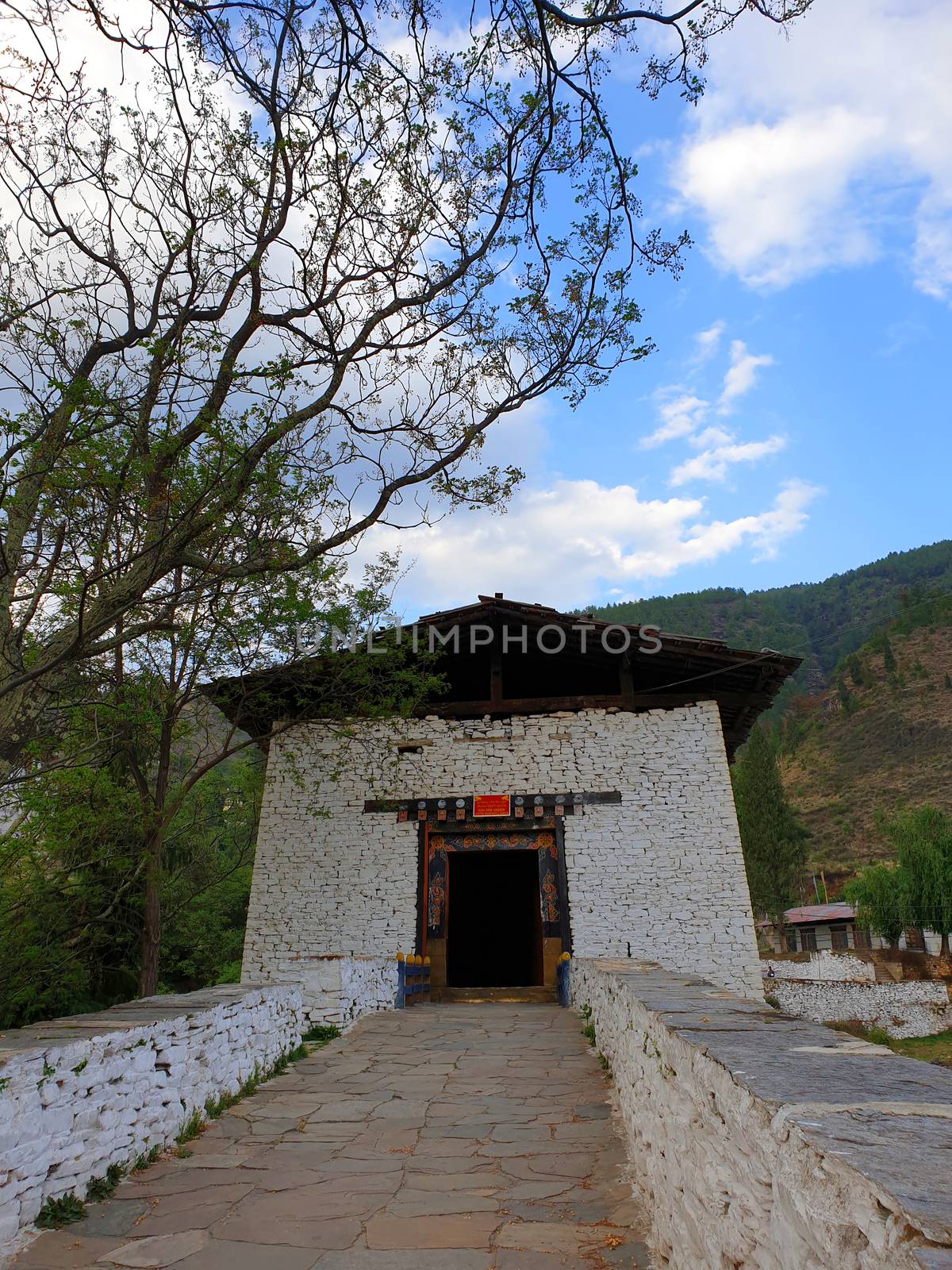 A bridge crossing the river to lead to the Rinpung Dzong in Paro, Bhutan