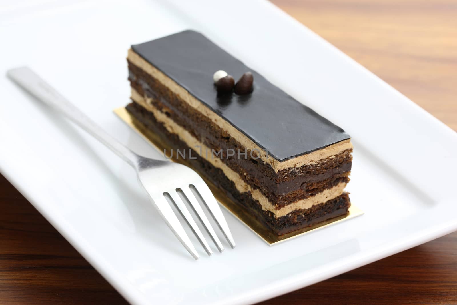 Chocolate Cake in wood background by piyato
