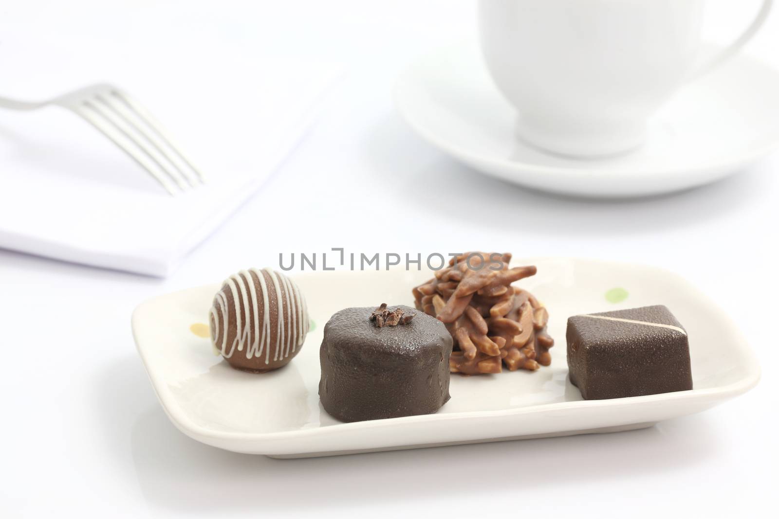 Chocolated with coffee cup isolated in white background
