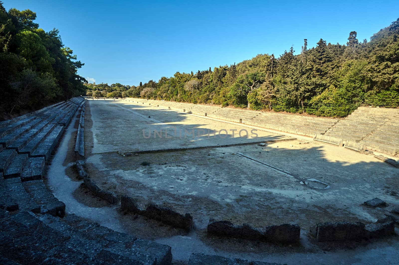 Stone ruins of a Hellenistic era stadium in the city of Rhodes, Greece
