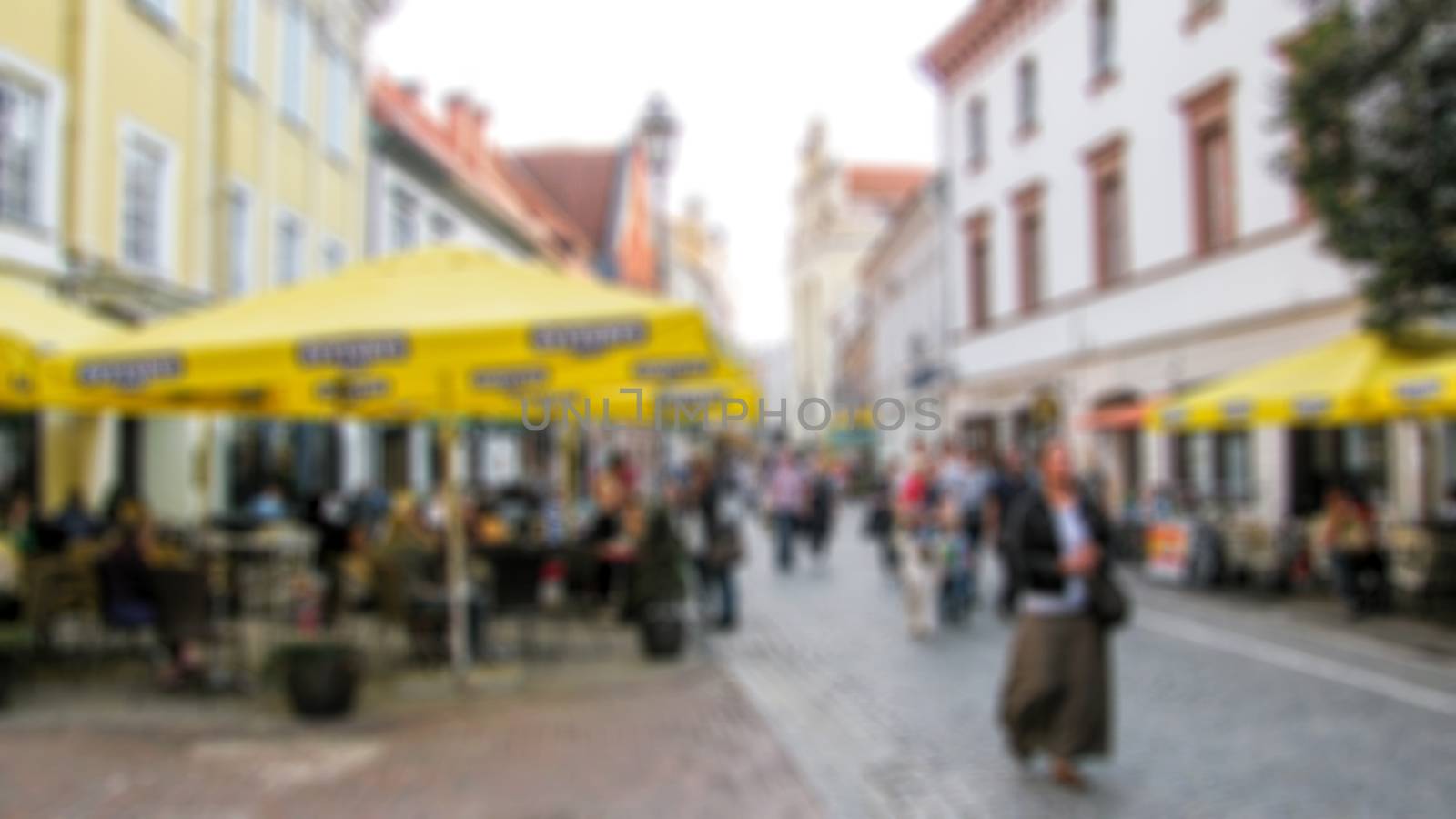 Urban streetscape. Theme of street photography, tourism and travel creative abstract background with blur and bokeh effect                      