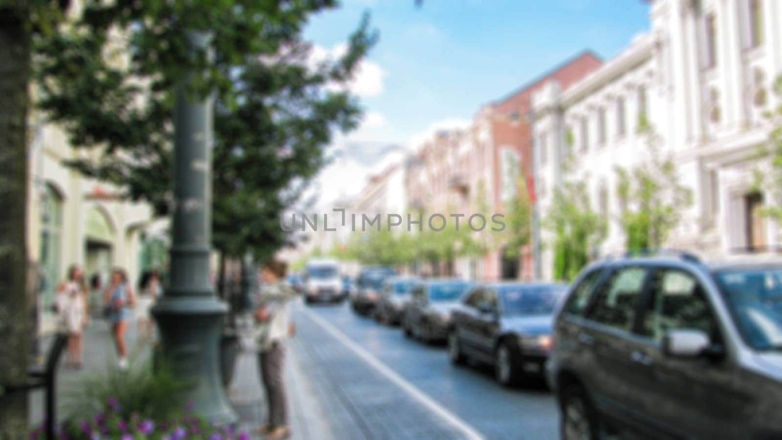 Urban streetscape. Theme of street photography, tourism and travel creative abstract background with blur and bokeh effect
