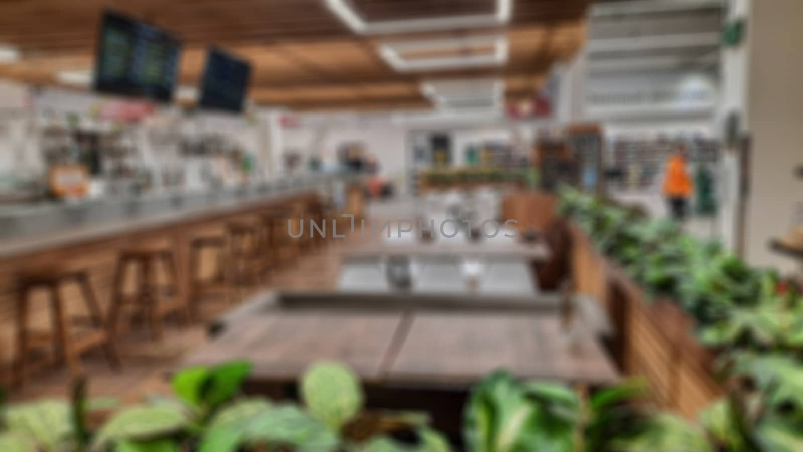 Abstract blur of the cafe hall. Creative theme with blurred background and bokeh for themed posters, banners and screensavers