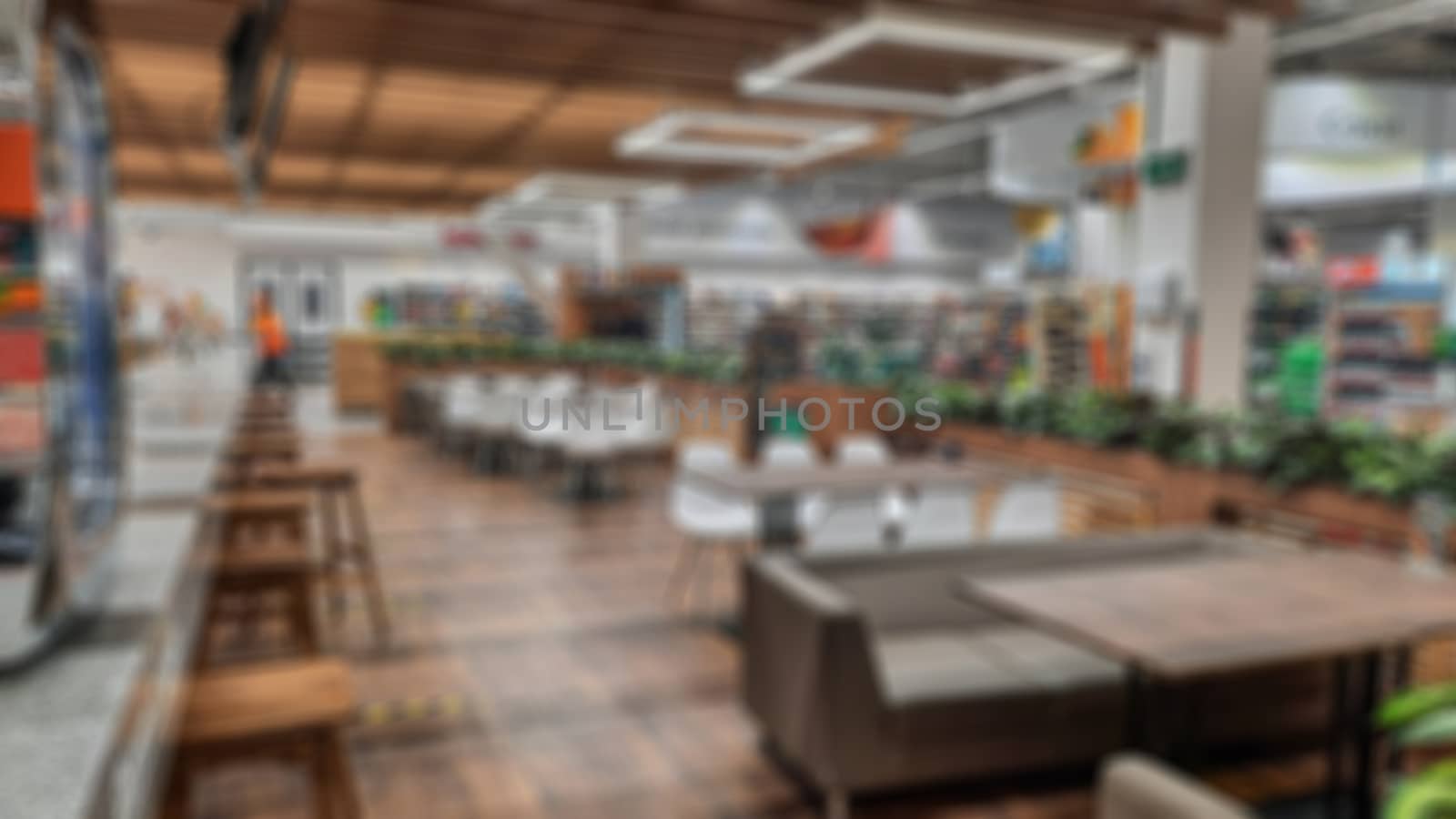 Abstract blur of the cafe hall. Creative theme with blurred background and bokeh for themed posters, banners and screensavers