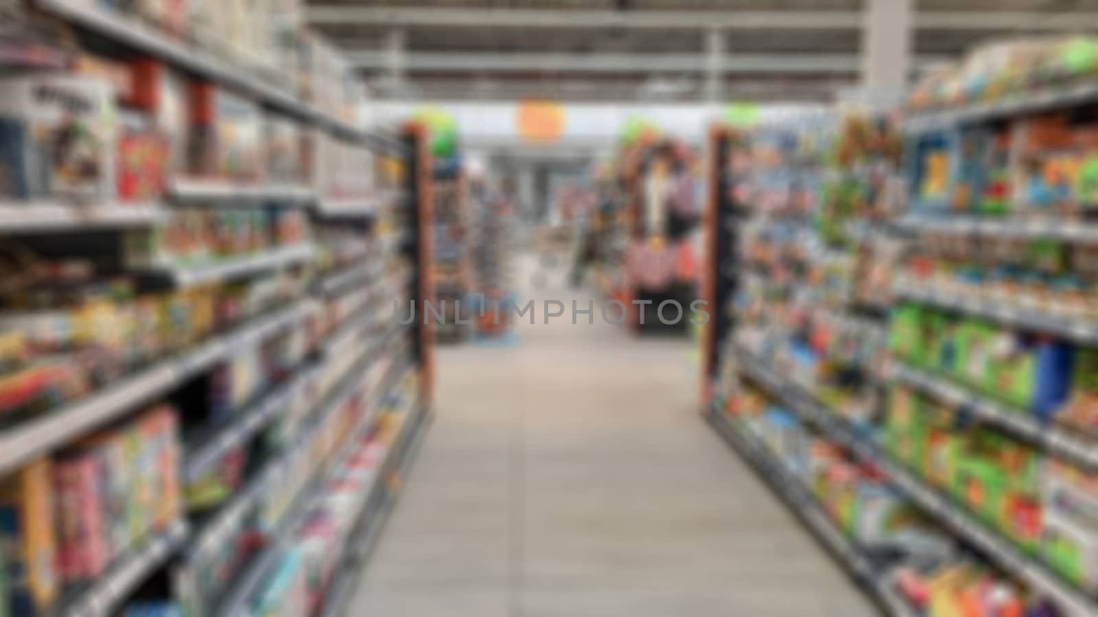 Abstract blurring of supermarket aisles. Creative theme with blurred background and bokeh for themed posters, banners and screensavers
