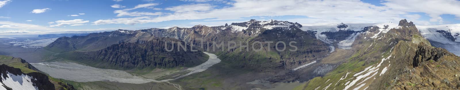 wide landscape panorama, panoramic view from peak Kristinartindar, Skaftafell Park on valley Morsardalur, river delta, colorful rhyolit mountains, glacier tongues Skaftafellsjokull Vatnajokull spur