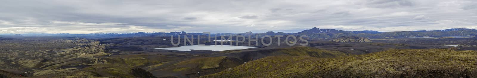 Colorful wide panorama, panoramic view on Volcanic landscape in Lakagigar, Laki Volcano crater chain with green lichens, moss and lakes Kambavatn and Lambavatn, Iceland, moody sky background by Henkeova