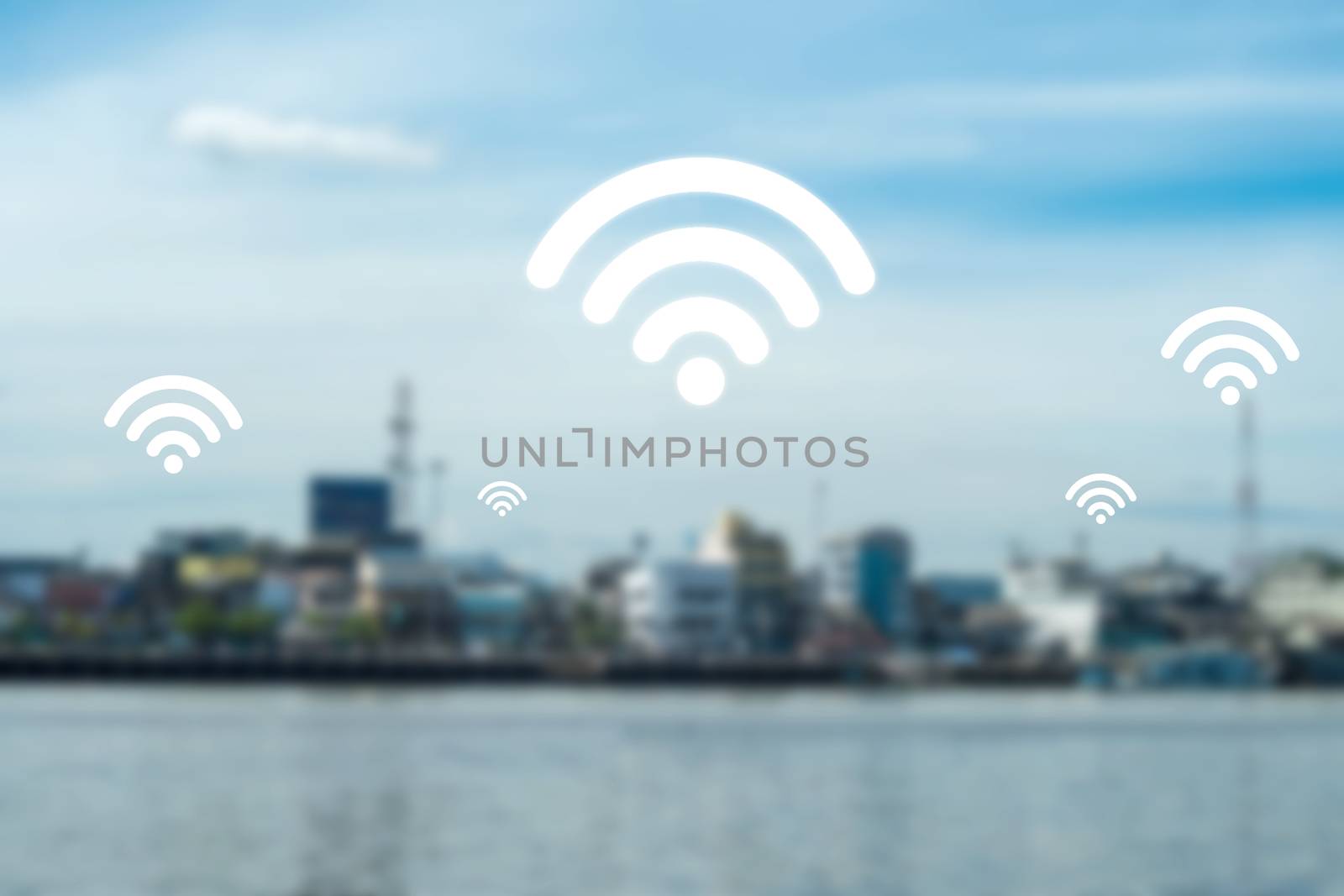 Wifi icon show around on blur city scape background connection network concept.