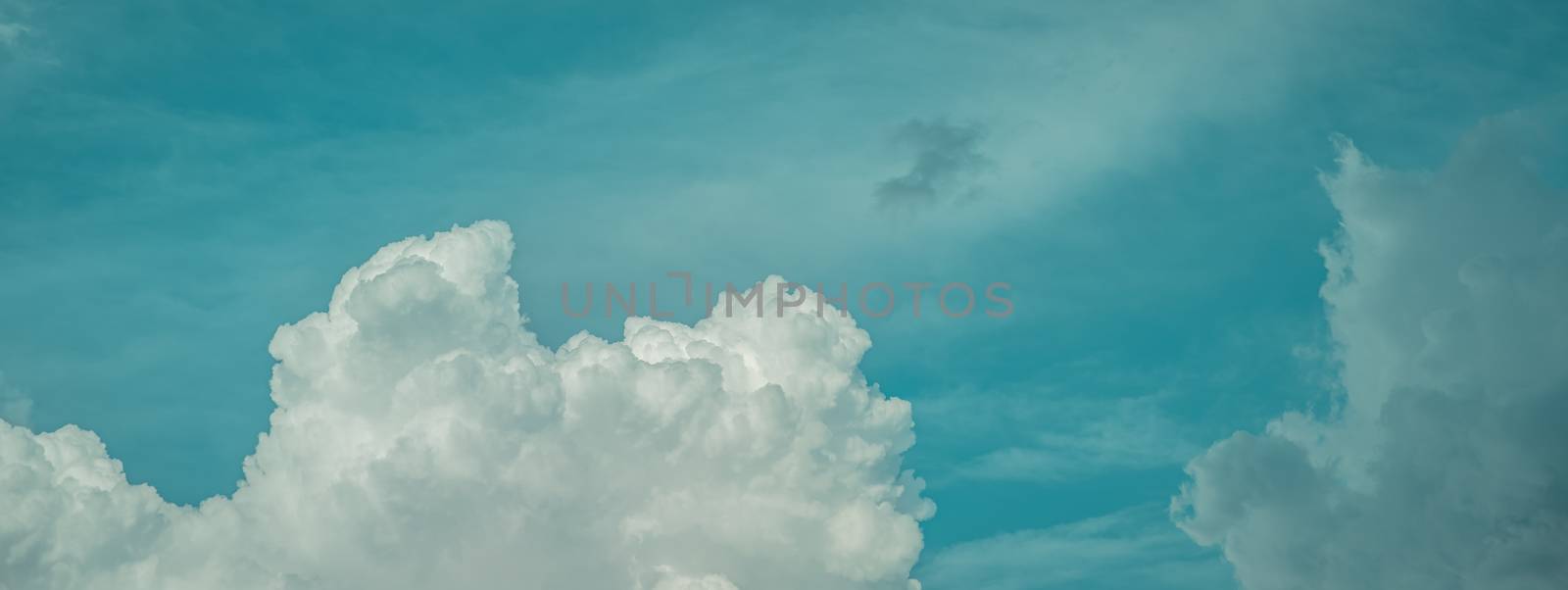 blue sky with white clouds in sunny weather. copy space