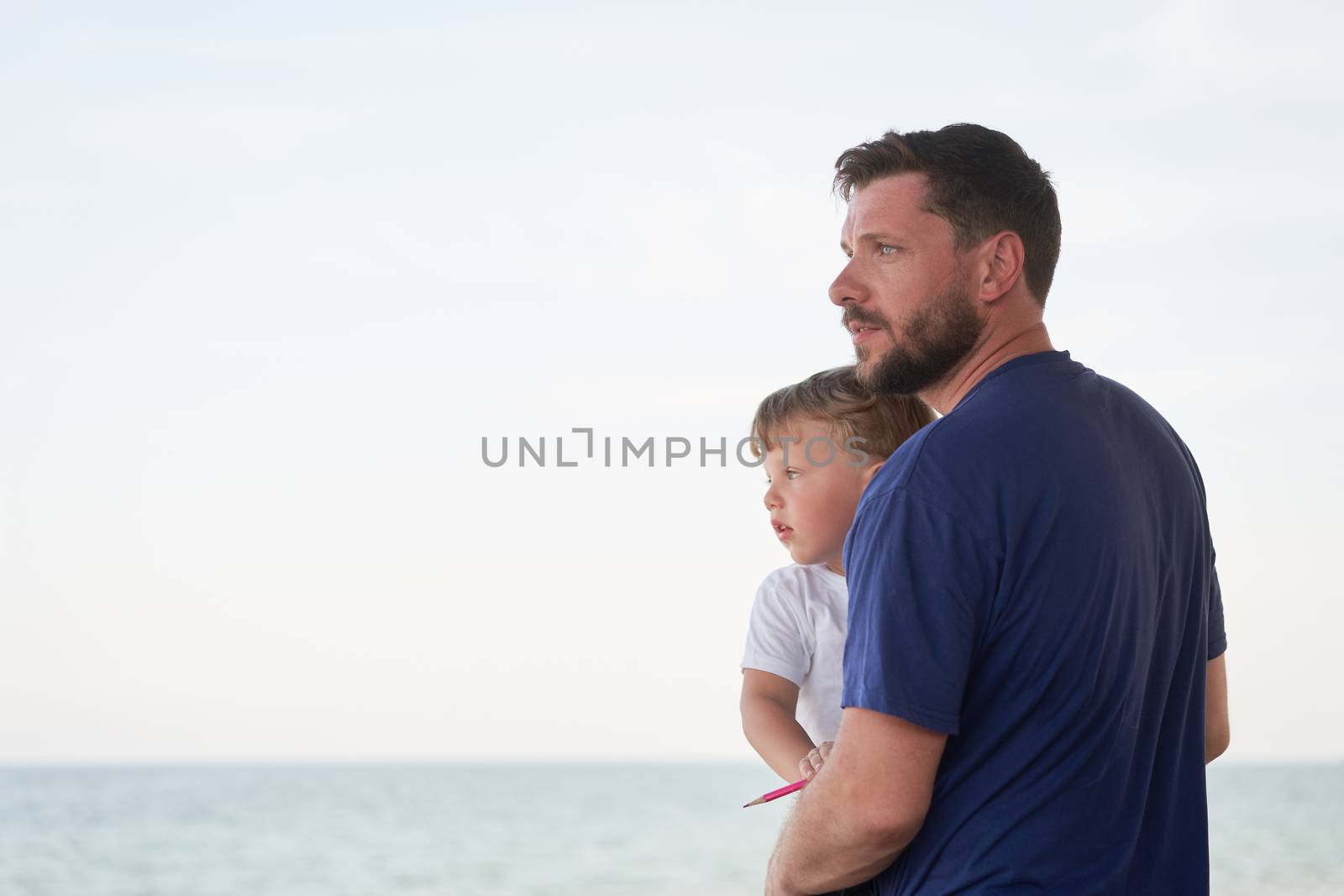 Father son spending time together sea vacation Young dad child little boy walking beach Fathers day. Family with one child. Happy childhood with daddy.