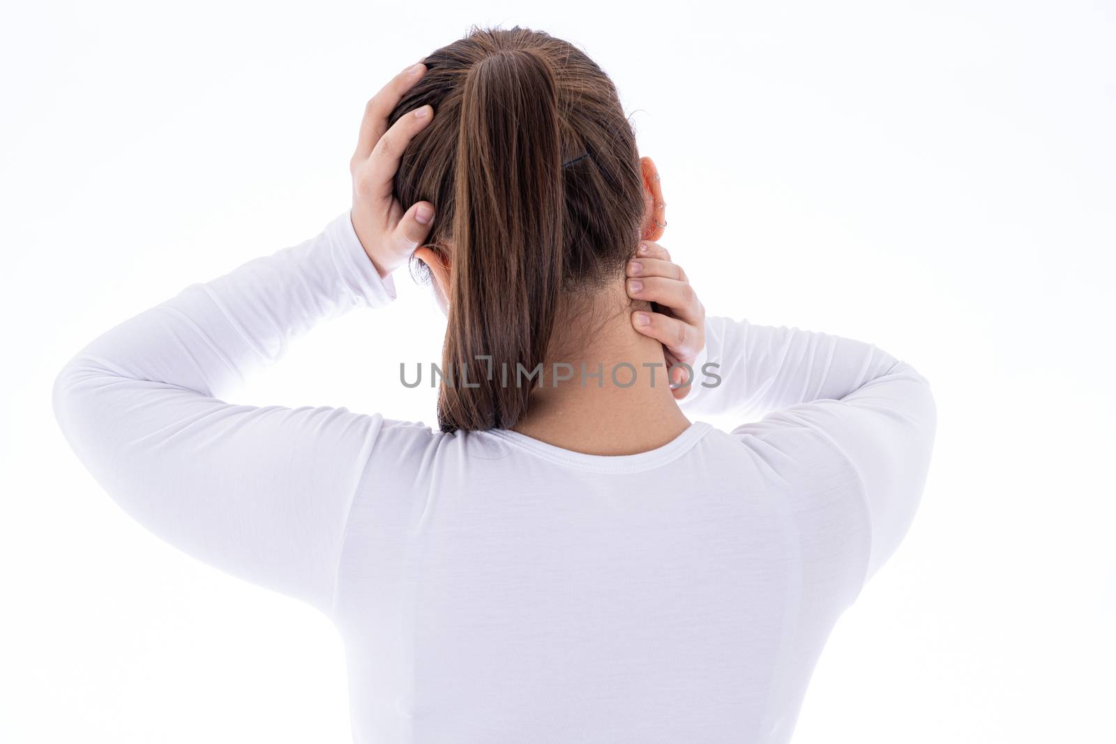 A woman feeling exhausted and suffering from neck and head pain and injury on isolated white background. Health care and medical concept.