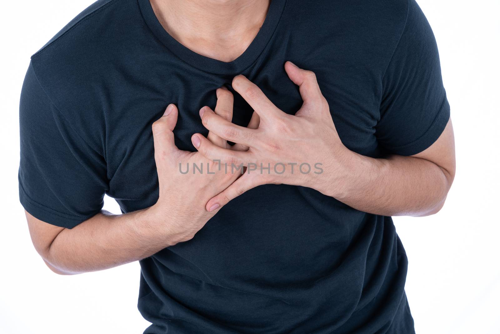 A man feeling exhausted and suffering from heart pain and injury on isolated white background. Health care and medical concept.