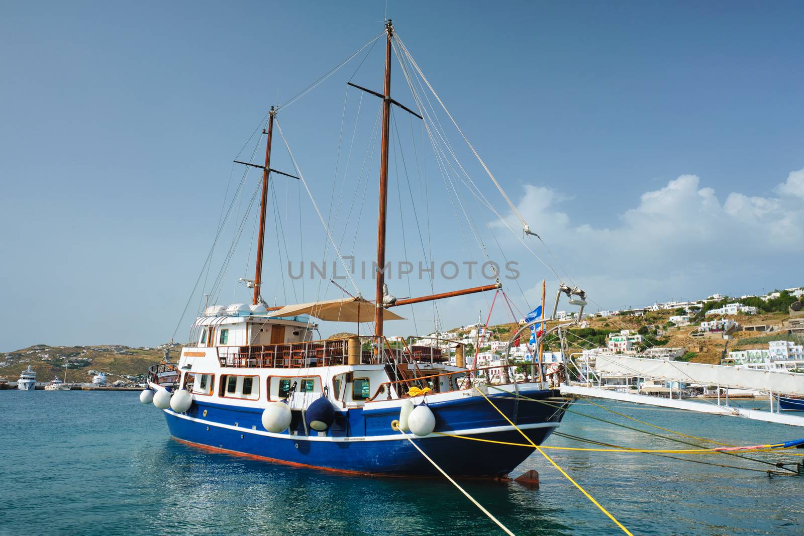 Vessel schooner moored in port harbor of Mykonos island, Greece by dimol