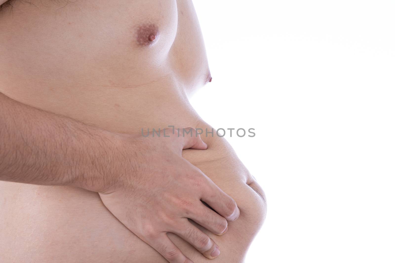 Close up the excessive fat belly on isolated white background. Man overweight abdomen. Man diet lifestyle concept reduce belly and shape up healthy stomach muscle. Weight loss, slim body concept.