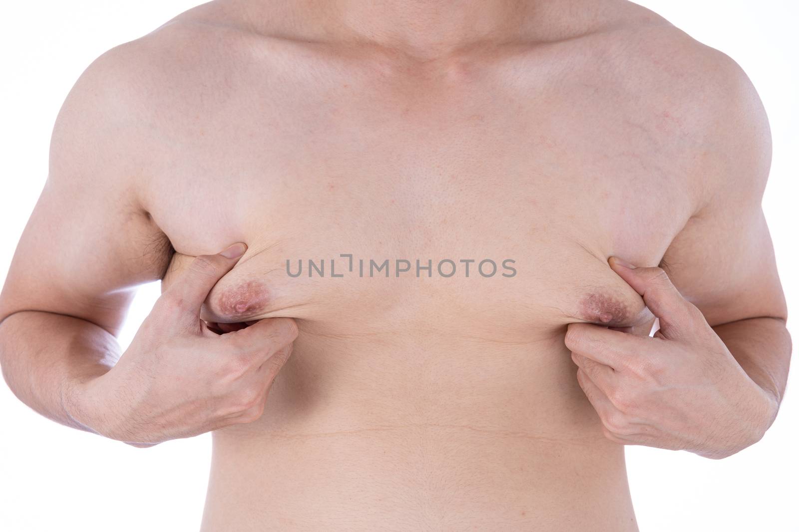 Close up man holding men boobs on white background. Diet, weight loss, slim body, healthy lifestyle concept.