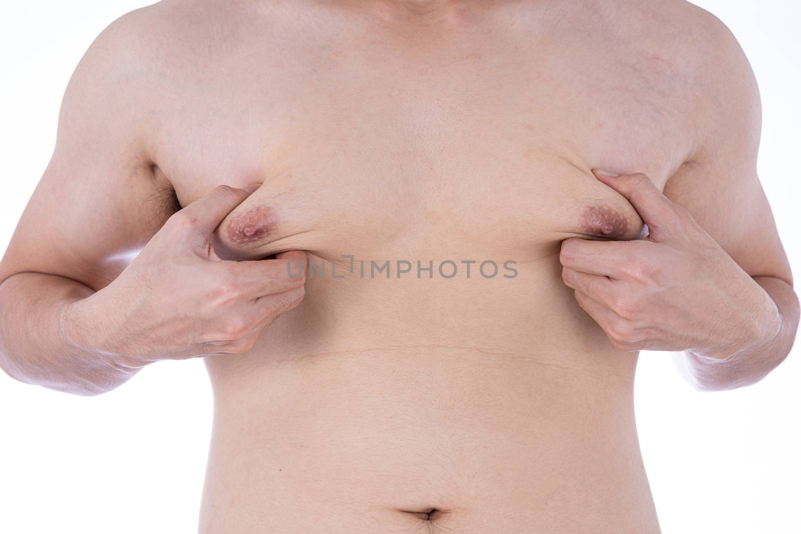 Close up man holding men boobs on white background. Diet, weight loss, slim body, healthy lifestyle concept.