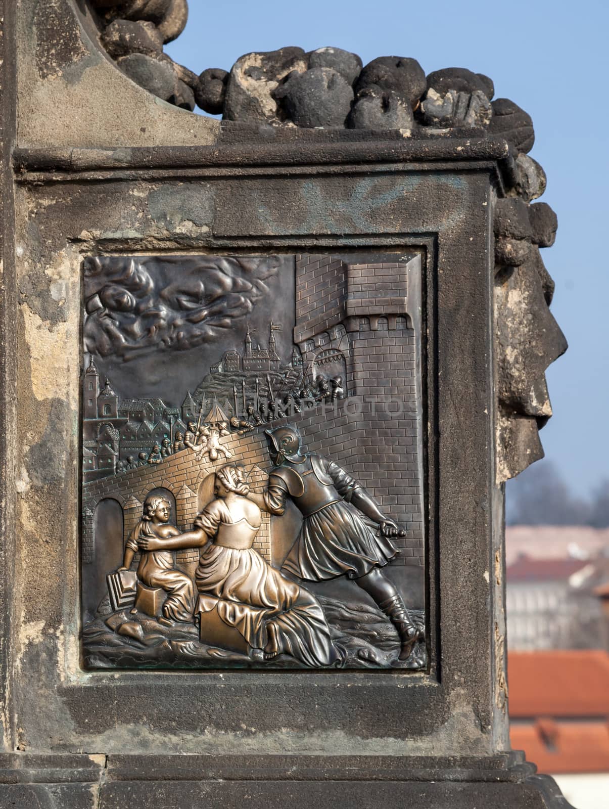 Base of John of Nepomuk statue on the Charles bridge in Prague by Goodday