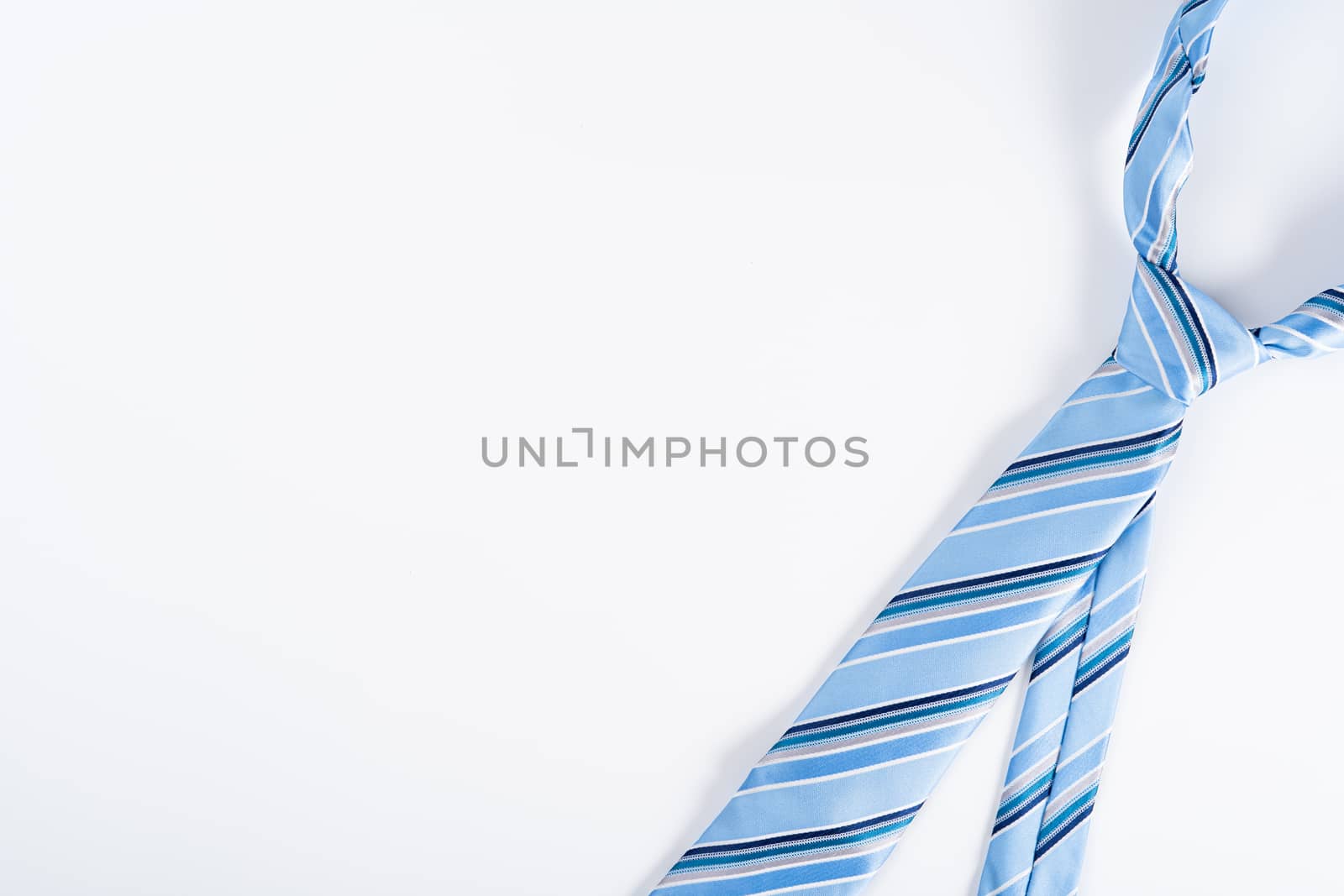 Happy Father Day background concept with blue necktie on white background with copy space for text.