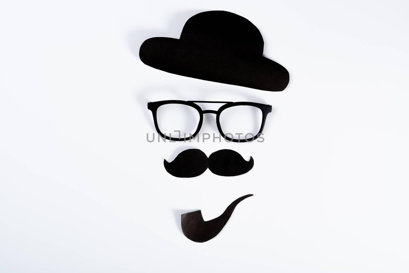 Happy Father Day background concept with paper cut of hat, glasses, black mustache and smoking pipe on white background with copy space for text.
