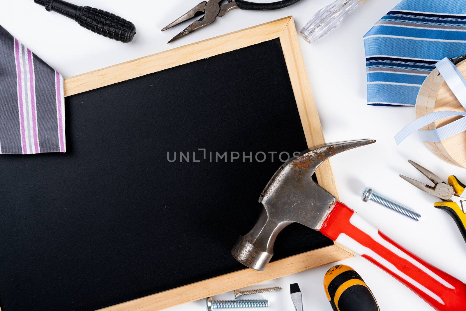 Happy Father Day background concept with tools, blackboard and tie on white background with copy space for text.