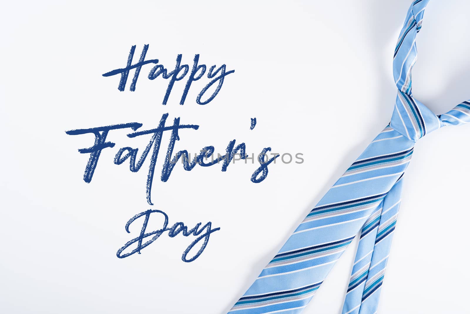 Happy Father Day background concept with blue necktie on white background with copy space for text.