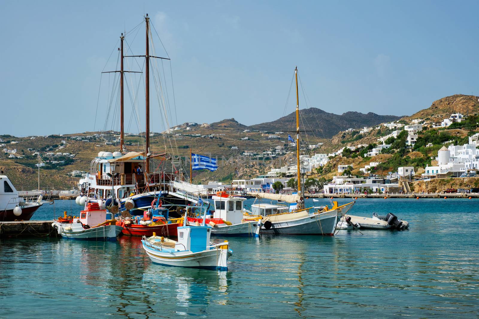 Mykonos port with fishing boats and yachts and vessels. Mykonos island, Greece