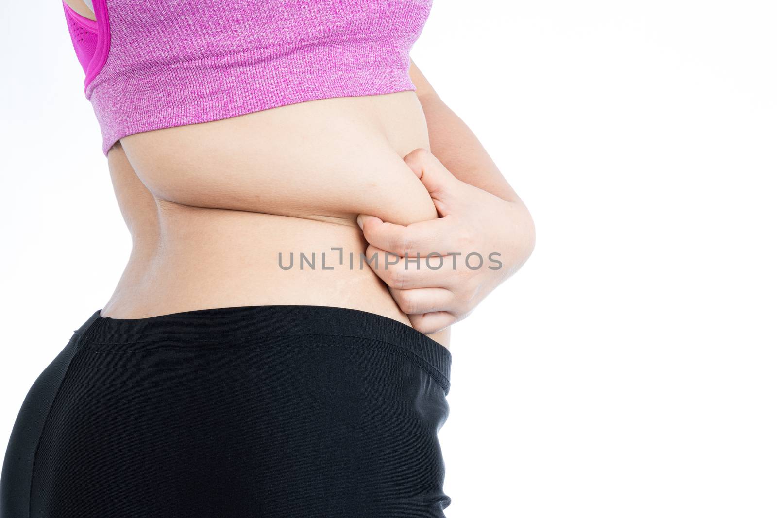 Fat woman holding excessive fat belly lower back, overweight fatty belly isolated on over white background. Diet lifestyle, weight loss, stomach muscle, healthy concept.