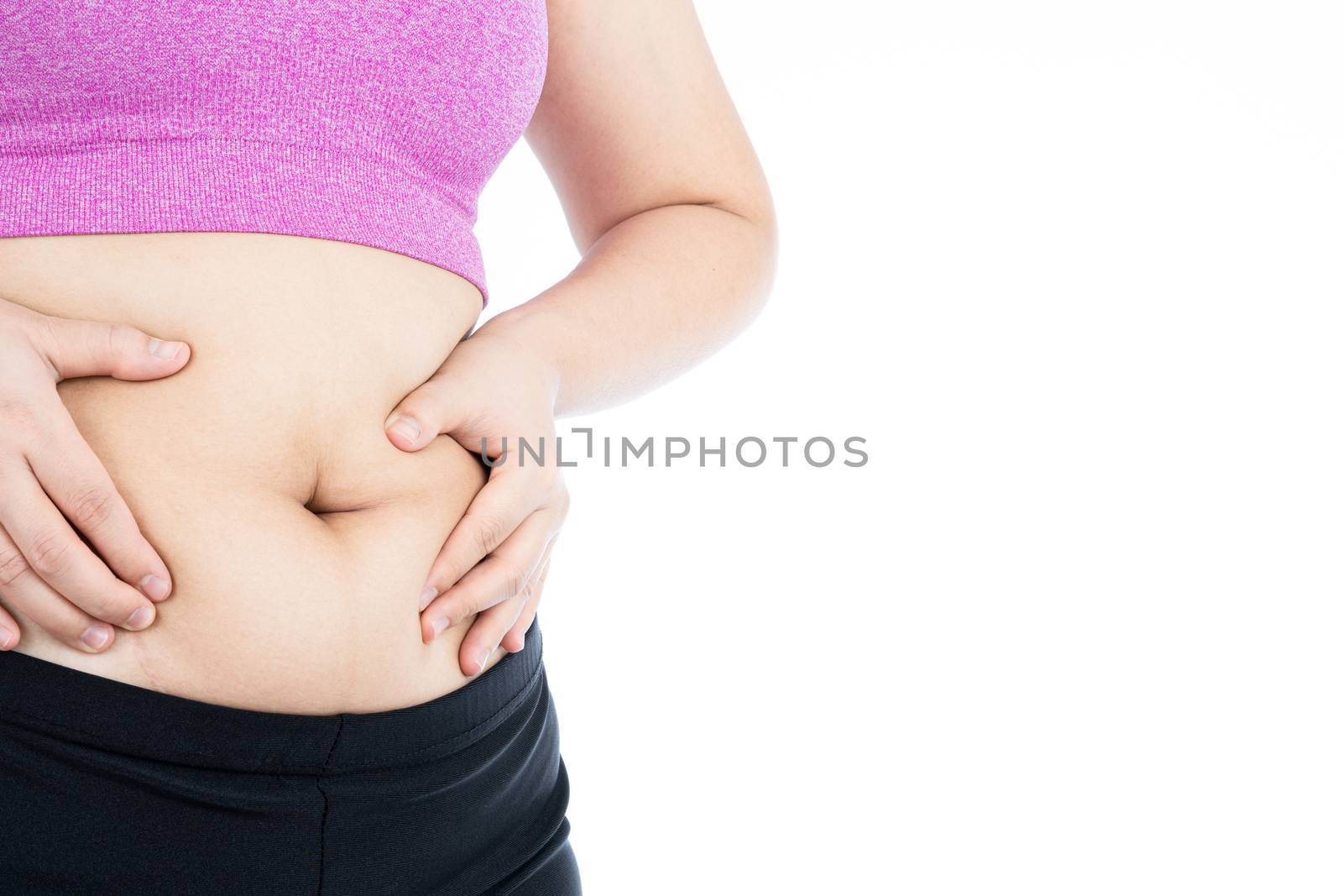 Fat woman holding excessive fat belly, overweight fatty belly isolated on over white background. Diet lifestyle, weight loss, stomach muscle, healthy concept.