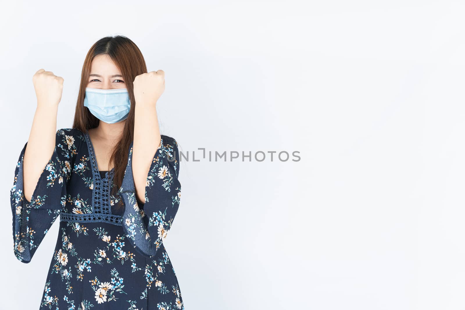 Asian beautiful happy hipster woman wearing a medical protection by mikesaran