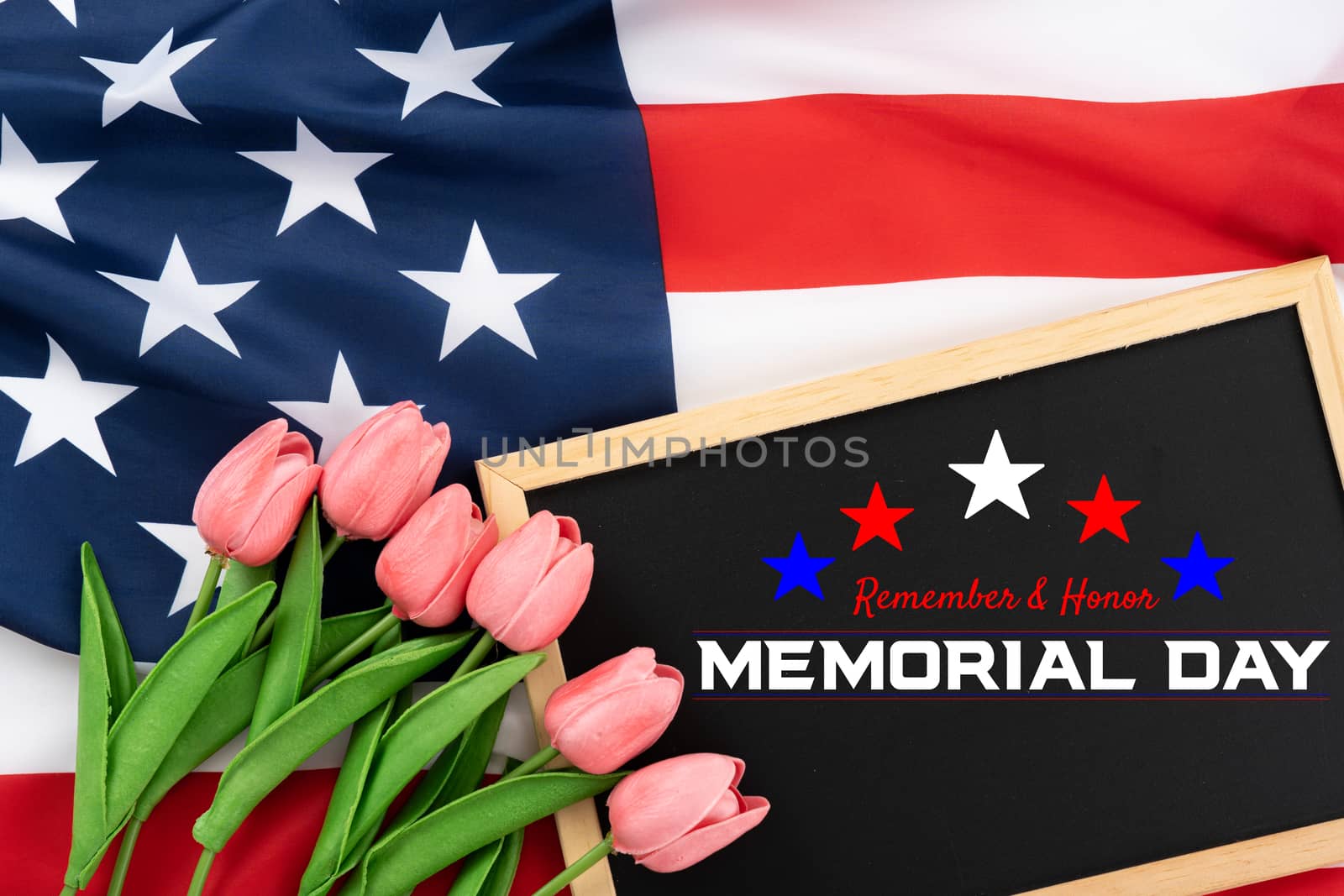 US American flag with blackboard and tulip on white background. For USA Memorial day. Top view with memorial day text.